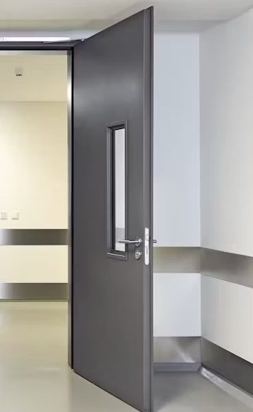 Portes en acier architecturales robustes installées pour projet commercial – Raymond Architectural